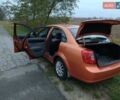 Оранжевый Шевроле Лачетти, объемом двигателя 1.6 л и пробегом 335 тыс. км за 4300 $, фото 11 на Automoto.ua