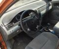 Помаранчевий Шевроле Лачетті, об'ємом двигуна 1.6 л та пробігом 220 тис. км за 3600 $, фото 2 на Automoto.ua