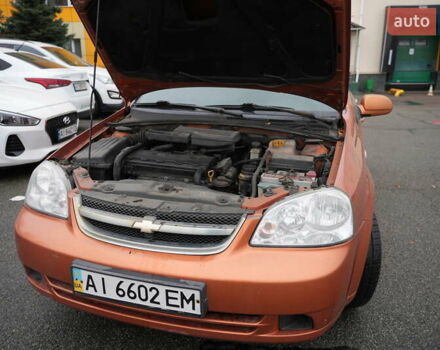 Оранжевый Шевроле Лачетти, объемом двигателя 1.8 л и пробегом 300 тыс. км за 3302 $, фото 4 на Automoto.ua