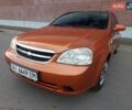 Оранжевый Шевроле Лачетти, объемом двигателя 1.8 л и пробегом 169 тыс. км за 3700 $, фото 1 на Automoto.ua