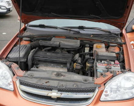 Оранжевый Шевроле Лачетти, объемом двигателя 1.8 л и пробегом 300 тыс. км за 3302 $, фото 6 на Automoto.ua
