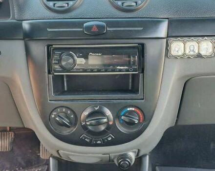 Оранжевый Шевроле Лачетти, объемом двигателя 1.8 л и пробегом 270 тыс. км за 5300 $, фото 12 на Automoto.ua