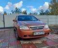 Оранжевый Шевроле Лачетти, объемом двигателя 1.8 л и пробегом 270 тыс. км за 5300 $, фото 1 на Automoto.ua