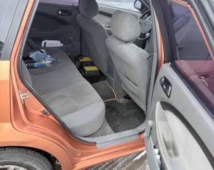 Оранжевый Шевроле Лачетти, объемом двигателя 1.8 л и пробегом 340 тыс. км за 4300 $, фото 6 на Automoto.ua