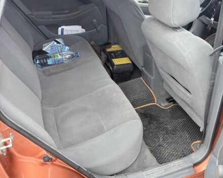 Оранжевый Шевроле Лачетти, объемом двигателя 1.8 л и пробегом 340 тыс. км за 4300 $, фото 9 на Automoto.ua