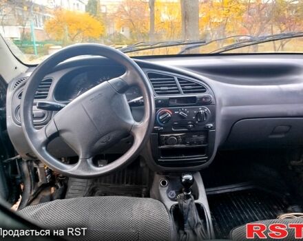 Черный Шевроле Ланос, объемом двигателя 1.5 л и пробегом 480 тыс. км за 1500 $, фото 1 на Automoto.ua