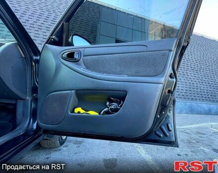 Чорний Шевроле Ланос, об'ємом двигуна 1.5 л та пробігом 217 тис. км за 2330 $, фото 6 на Automoto.ua