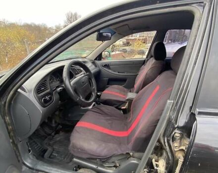 Черный Шевроле Ланос, объемом двигателя 1.5 л и пробегом 200 тыс. км за 2800 $, фото 8 на Automoto.ua