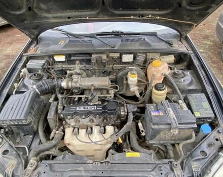 Черный Шевроле Ланос, объемом двигателя 1.5 л и пробегом 200 тыс. км за 2800 $, фото 11 на Automoto.ua