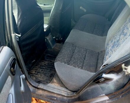 Черный Шевроле Ланос, объемом двигателя 1.5 л и пробегом 480 тыс. км за 1500 $, фото 4 на Automoto.ua