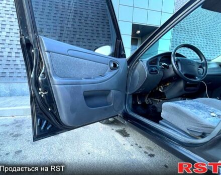 Чорний Шевроле Ланос, об'ємом двигуна 1.5 л та пробігом 217 тис. км за 2330 $, фото 7 на Automoto.ua