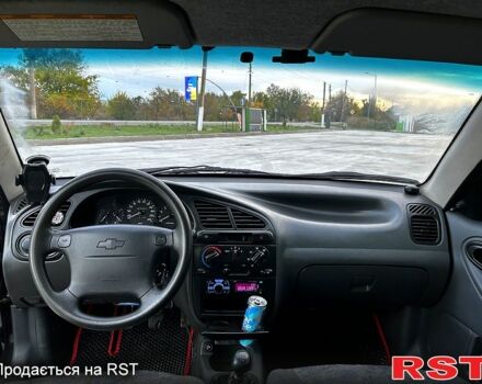 Чорний Шевроле Ланос, об'ємом двигуна 1.5 л та пробігом 250 тис. км за 2300 $, фото 7 на Automoto.ua