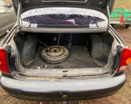 Черный Шевроле Ланос, объемом двигателя 1.5 л и пробегом 200 тыс. км за 2800 $, фото 13 на Automoto.ua