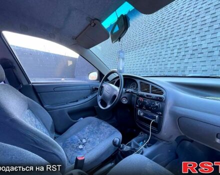 Чорний Шевроле Ланос, об'ємом двигуна 1.5 л та пробігом 217 тис. км за 2330 $, фото 5 на Automoto.ua