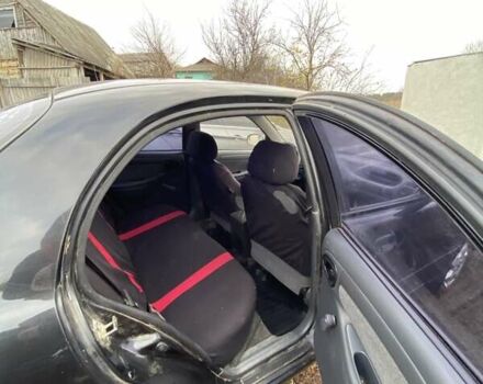 Черный Шевроле Ланос, объемом двигателя 1.5 л и пробегом 200 тыс. км за 2800 $, фото 10 на Automoto.ua