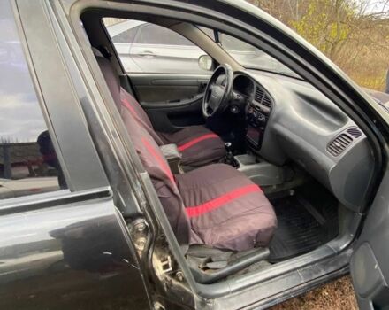 Черный Шевроле Ланос, объемом двигателя 1.5 л и пробегом 200 тыс. км за 2800 $, фото 11 на Automoto.ua