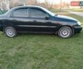 Чорний Шевроле Ланос, об'ємом двигуна 1.5 л та пробігом 211 тис. км за 3000 $, фото 4 на Automoto.ua