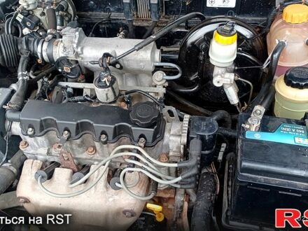 Черный Шевроле Ланос, объемом двигателя 1.5 л и пробегом 210 тыс. км за 1500 $, фото 1 на Automoto.ua