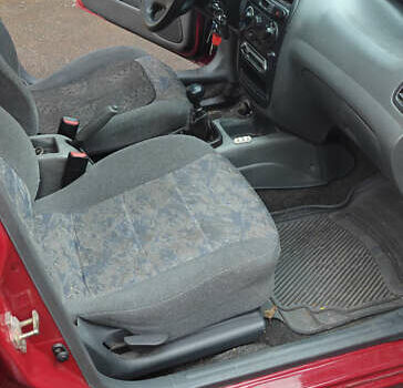 Красный Шевроле Ланос, объемом двигателя 1.5 л и пробегом 307 тыс. км за 2700 $, фото 10 на Automoto.ua