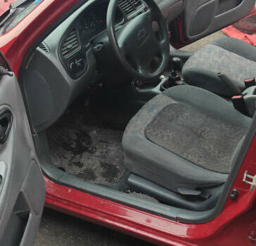 Красный Шевроле Ланос, объемом двигателя 1.5 л и пробегом 307 тыс. км за 2700 $, фото 8 на Automoto.ua