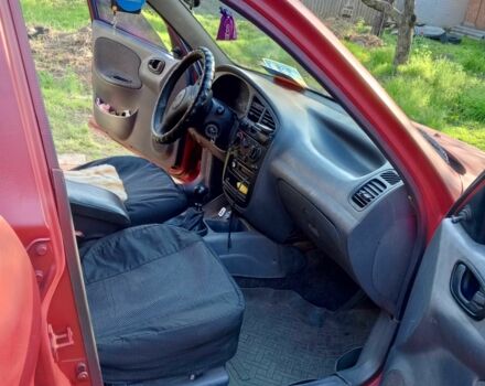 Красный Шевроле Ланос, объемом двигателя 1.5 л и пробегом 200 тыс. км за 1043 $, фото 3 на Automoto.ua