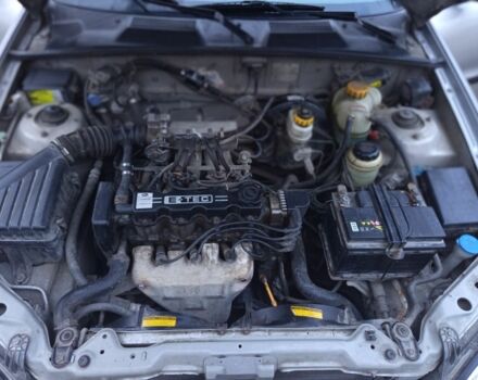 Серый Шевроле Ланос, объемом двигателя 1 л и пробегом 300 тыс. км за 1800 $, фото 3 на Automoto.ua