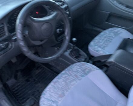 Серый Шевроле Ланос, объемом двигателя 1.5 л и пробегом 240 тыс. км за 1700 $, фото 5 на Automoto.ua