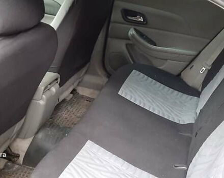 Черный Шевроле Малибу, объемом двигателя 2.5 л и пробегом 105 тыс. км за 8000 $, фото 1 на Automoto.ua