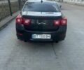 Сірий Шевроле Малібу, об'ємом двигуна 2.38 л та пробігом 230 тис. км за 8300 $, фото 1 на Automoto.ua