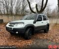 Белый Шевроле Нива, объемом двигателя 1.7 л и пробегом 157 тыс. км за 5999 $, фото 1 на Automoto.ua