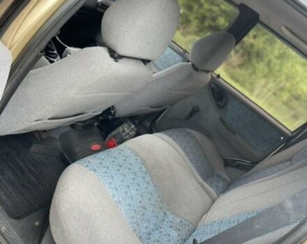 Бежевый Шевроле Нива, объемом двигателя 1.69 л и пробегом 250 тыс. км за 3000 $, фото 8 на Automoto.ua