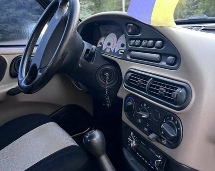 Бежевый Шевроле Нива, объемом двигателя 1.69 л и пробегом 125 тыс. км за 3600 $, фото 7 на Automoto.ua