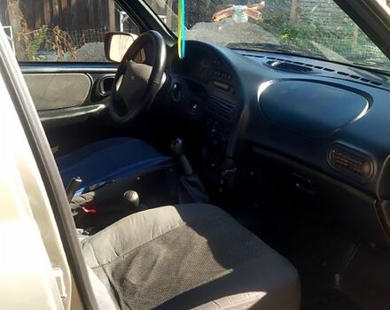 Бежевий Шевроле Нива, об'ємом двигуна 1.7 л та пробігом 155 тис. км за 4500 $, фото 1 на Automoto.ua