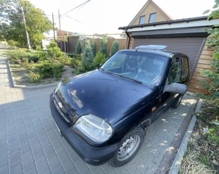 Черный Шевроле Нива, объемом двигателя 1.7 л и пробегом 250 тыс. км за 3800 $, фото 6 на Automoto.ua