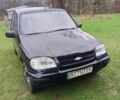 Черный Шевроле Нива, объемом двигателя 1.7 л и пробегом 167 тыс. км за 3800 $, фото 1 на Automoto.ua