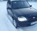 Черный Шевроле Нива, объемом двигателя 1.7 л и пробегом 170 тыс. км за 4300 $, фото 1 на Automoto.ua