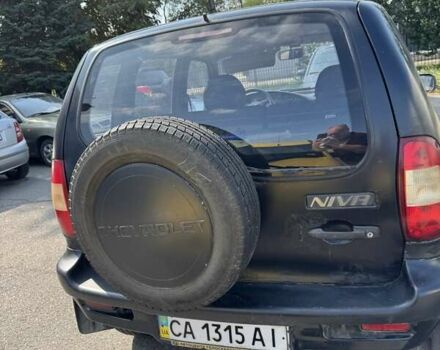 Чорний Шевроле Нива, об'ємом двигуна 1.69 л та пробігом 228 тис. км за 1900 $, фото 1 на Automoto.ua