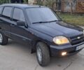 Черный Шевроле Нива, объемом двигателя 1.7 л и пробегом 210 тыс. км за 3300 $, фото 10 на Automoto.ua