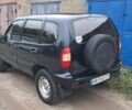 Черный Шевроле Нива, объемом двигателя 1.7 л и пробегом 210 тыс. км за 3300 $, фото 2 на Automoto.ua