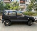 Черный Шевроле Нива, объемом двигателя 1.7 л и пробегом 373 тыс. км за 3400 $, фото 1 на Automoto.ua
