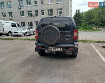 Черный Шевроле Нива, объемом двигателя 1.69 л и пробегом 260 тыс. км за 3800 $, фото 2 на Automoto.ua