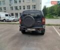Черный Шевроле Нива, объемом двигателя 1.69 л и пробегом 260 тыс. км за 3800 $, фото 2 на Automoto.ua