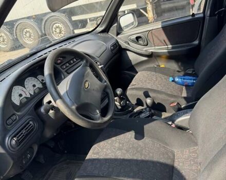 Чорний Шевроле Нива, об'ємом двигуна 1.69 л та пробігом 228 тис. км за 1900 $, фото 7 на Automoto.ua
