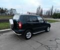Черный Шевроле Нива, объемом двигателя 1.7 л и пробегом 195 тыс. км за 3100 $, фото 2 на Automoto.ua