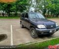 Черный Шевроле Нива, объемом двигателя 1.7 л и пробегом 260 тыс. км за 3800 $, фото 1 на Automoto.ua