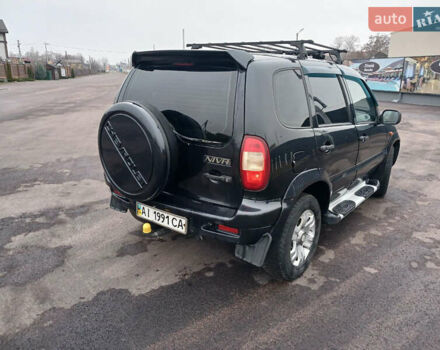 Чорний Шевроле Нива, об'ємом двигуна 1.69 л та пробігом 206 тис. км за 4800 $, фото 3 на Automoto.ua