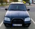 Черный Шевроле Нива, объемом двигателя 1.7 л и пробегом 158 тыс. км за 4200 $, фото 1 на Automoto.ua