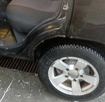 Черный Шевроле Нива, объемом двигателя 1.69 л и пробегом 189 тыс. км за 3500 $, фото 4 на Automoto.ua