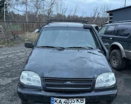 Черный Шевроле Нива, объемом двигателя 1.7 л и пробегом 200 тыс. км за 1307 $, фото 1 на Automoto.ua