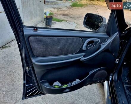 Черный Шевроле Нива, объемом двигателя 1.7 л и пробегом 282 тыс. км за 3999 $, фото 7 на Automoto.ua